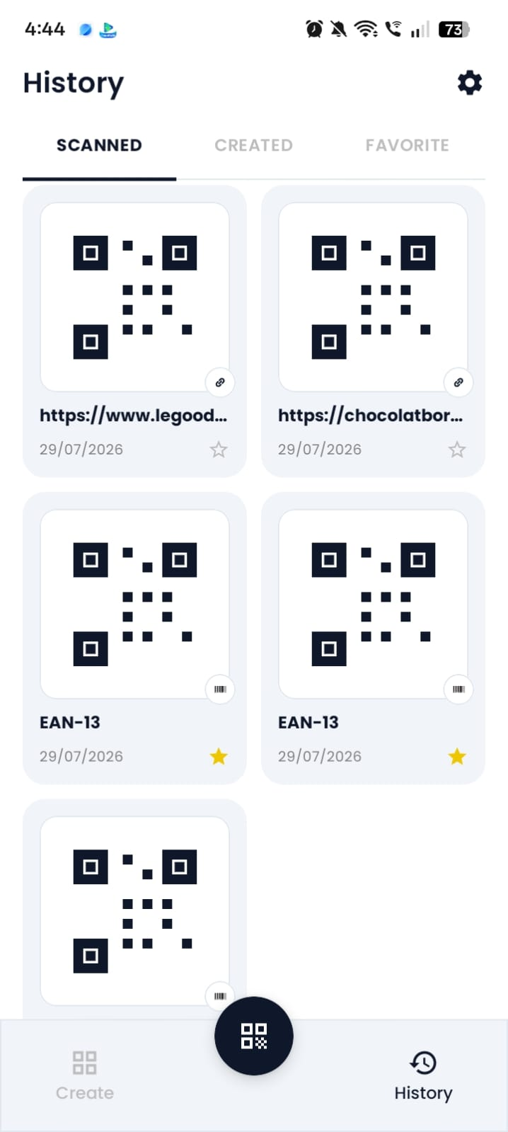 Scanned History screen listing previously scanned QR codes and barcodes